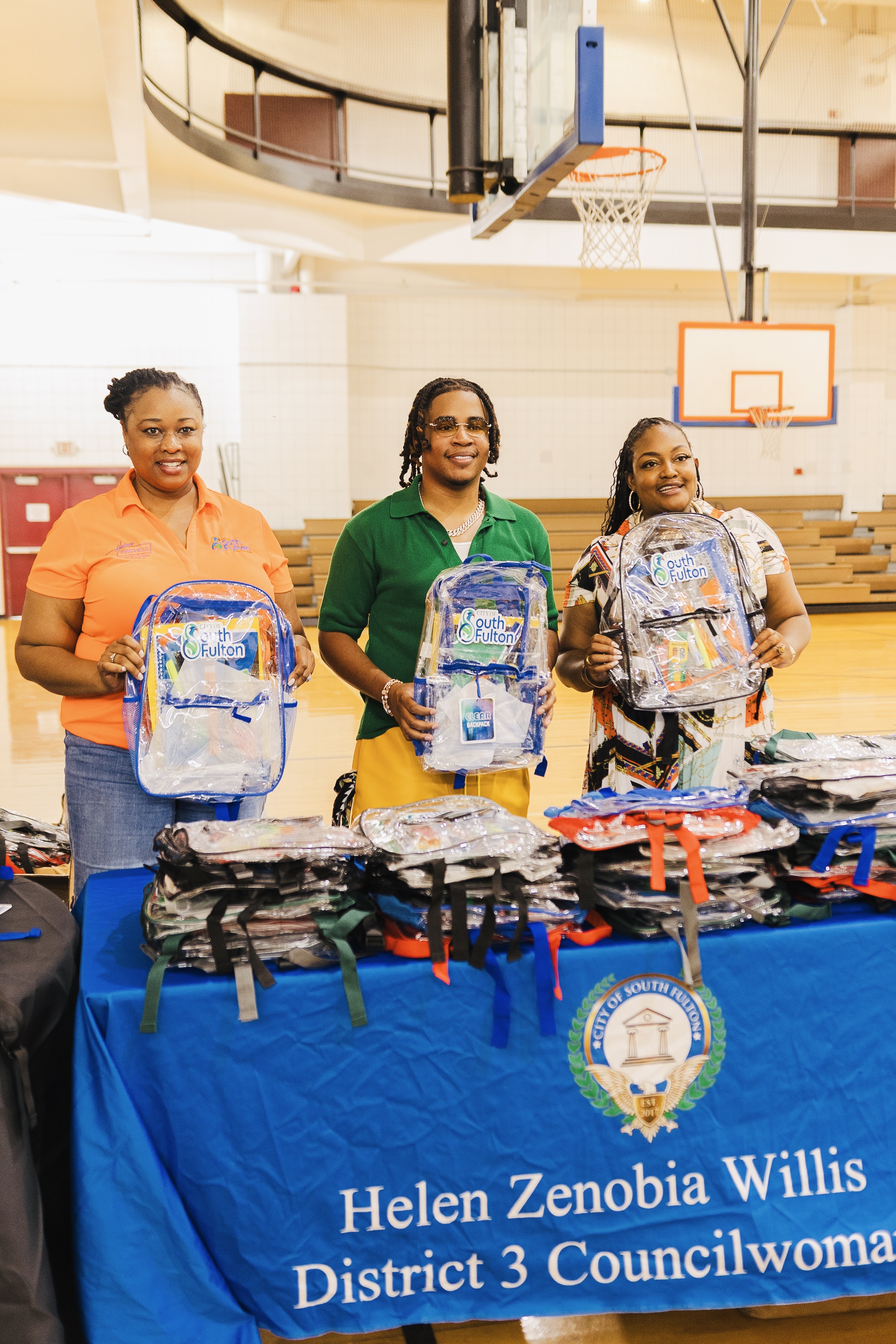 Turbo and councilwoman with bookbags